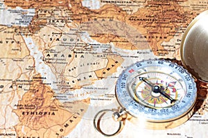 Travel destination Saudi Arabia, ancient map with vintage compass