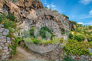 Travel destination, small old village in hear of Provence Cotignac with famous cliffs with cave dwellings and troglodytes houses