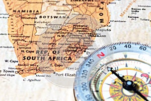 Travel destination South Africa, ancient map with vintage compass