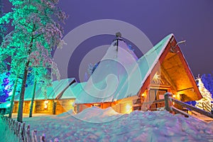 Travel Destinations Concepts. Unique Lapland Suomi Houses Over t photo