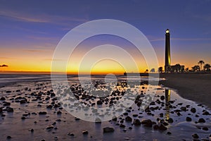 Travel Destinations. Lighthouse of Maspalomas At Gran canaria Island Known as  Faro de Maspalomas at Sunset During Blue Hour