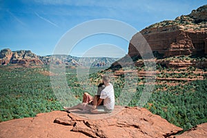 Travel in Devil's Bridge Trail, scenic view panoramic landscape in Sedona, Arizona, USA. Happy Couple on the famous