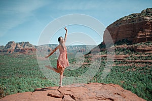 Travel in Devil& x27;s Bridge Trail, scenic view panoramic landscape in Sedona, Arizona, USA. Happy young woman on the