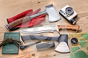 Travel, explore and adventure with camera, axes, knife, compass, fire starter for travel, survival and outdoor life