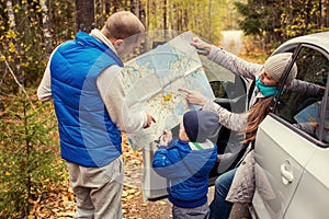 Travel - family with camping car on the road