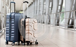Travel Fashion. Closeup Of Two Plastic Suitcases Standing At Empty Airport Corridor