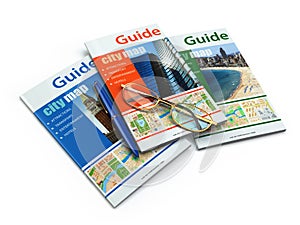 Travel guide books on white isolated background.