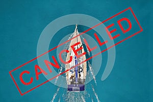 Travel holidays canceled due to the coronavirus pandemic. Closing borders around the world. Sea travel ban concept on a yacht.