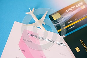 Travel insurance application form with passport credit cards airplane flight travel traveller fly travelling citizenship air