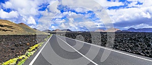 Travel in Lanzarote island - road through volcanic desert. Canary islands of Spain photo