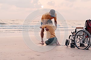 Travel and learning, Disabled child at the beach, Caring from family.