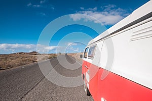 Travel on a long road with an old van