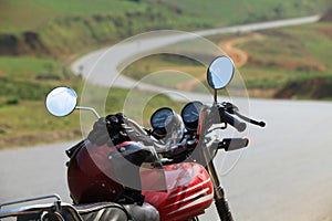 Travel by motorcycle on an empty road at sunny day in Vietnam