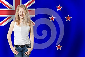 Travel in New Zealand. Happy girl student with New Zealand flag