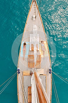 Travel, ocean and women on boat for cruise, luxury sailing and transport for holiday, vacation and trip. Relax, summer