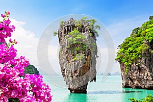 Travel photo of James Bond island with beautiful turquoise water in Phang Nga bay, Thailand