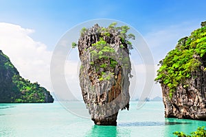 Travel photo of James Bond island with beautiful turquoise water in Phang Nga bay, Thailand