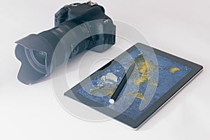 Travel photography concept, DSLR, digital tablet