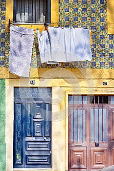 Travel Places Concepts. Unique Entrance Door with Traditional Azulejo Tiles in Porto, Portugal