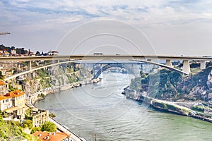 Travel Places Ideas. Porto Cityscape at Daytime with Ponte Infante D Henrique in Background in Portugal