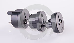 Travel plug adapter on a background