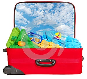 Travel red suitcase packed for summer vacation