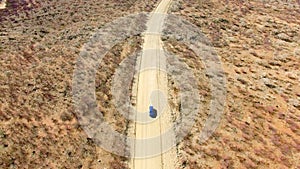 Travel, sand and desert with truck in dirt road of Australia countryside for freedom, transportation or journey