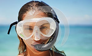 Travel, scuba diving and portrait of woman at the beach for swimming, summer and vacation. Tropical, holiday and gear