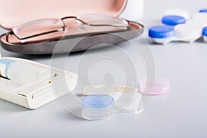 Travel set for storage of contact lenses alternative for glasses. Choice of vision correction