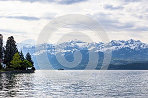 Travel ship in lake Thun and view of Bernese Alps mountain Berne, Switzerland