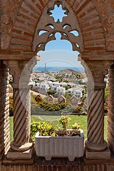 Travel sightseeing in Spain looking through castle window
