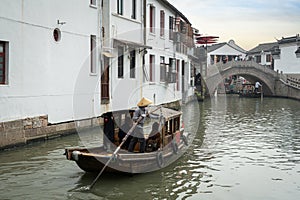 Travel in stone bridge boat and water town in zhouzhuang village