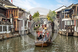 Travel in stone bridge boat and water town in zhouzhuang village