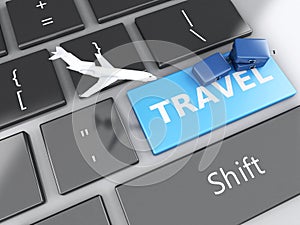 travel suitcase and airplane on computer keyboard. Travel concept