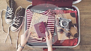 Travel suitcase preparing concept