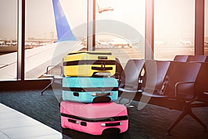 Travel suitcases in airport terminal. Summer vacation