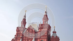Travel and technology. State Historical Museum taking selfie with backpack. slow motion video. on Red Square in Moscow