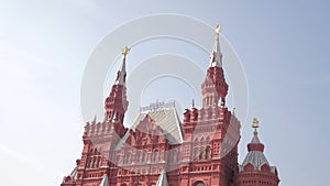Travel and technology. State Historical Museum taking selfie with backpack. slow motion video. on Red Square in Moscow