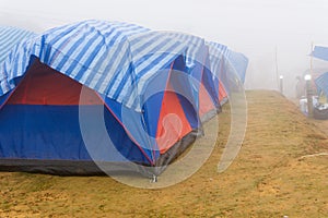 Travel tent in the morning with fog