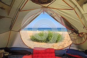 Travel tent with sea and sand view