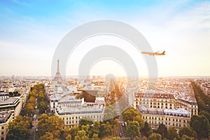 Travel to France, airplane flying over beautiful panoramic cityscape of Paris