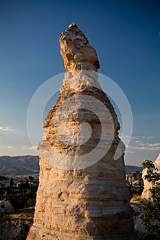 Travel to great wonders of nature troglodyte in sunset in blue sky, cappadocia, turkey