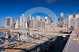 Travel to New York. The amazing skyline of Manhattan with these tall office building skyscrapers during the day.