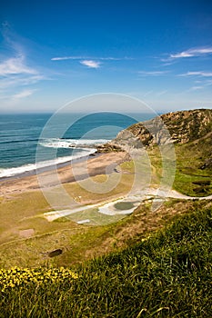 Travel to picturesque atlantic azkorri beach, spain