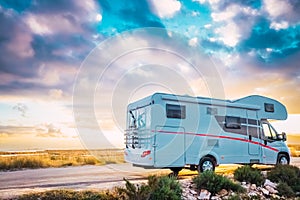 Travel to see beautiful sunsets by motorhome on holidays on rural roads