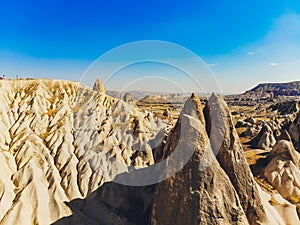 Travel to Turkey - above view of mountain valley with fairy chimney rocks in Goreme National Park in Cappadocia.