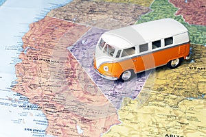 Travel to the United States of America USA. Hippie bus on the map of America. Travel concept