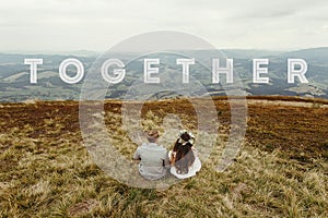 Travel together concept, text, happy gorgeous bride and groom si