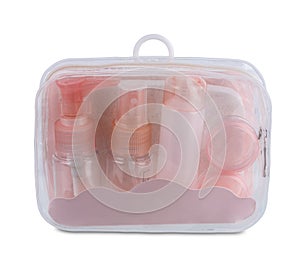 Travel Toiletries in Clear Plastic Bag isolated on white background