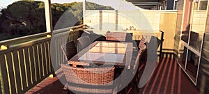 Travel and Tourism - Comfortable verandah overlooking the beach  in a comfortable cabin in camping ground at Merimbula NSW